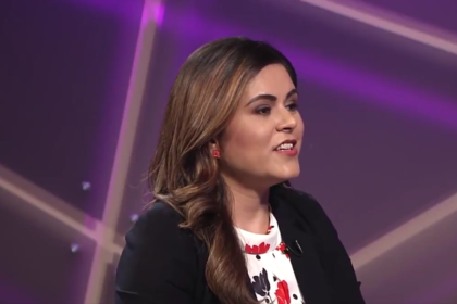 Malali Bashir Radio Azadi managing editor speaking during a television interview