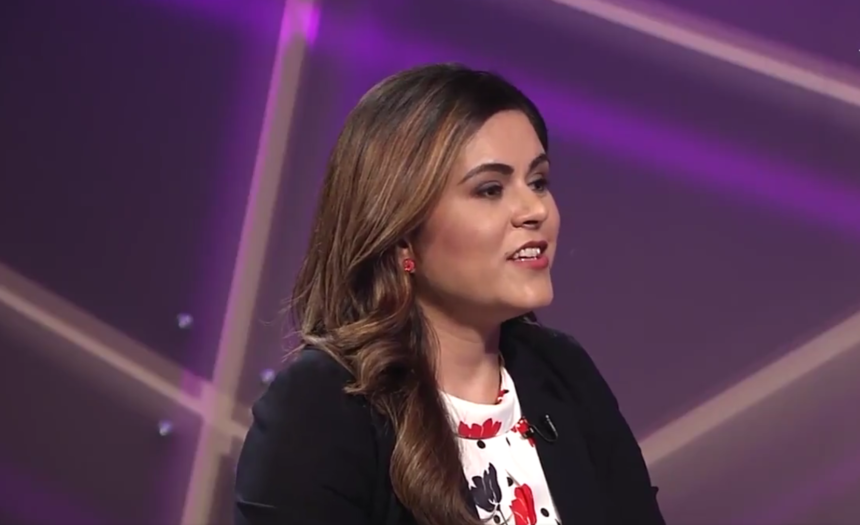 Malali Bashir Radio Azadi managing editor speaking during a television interview